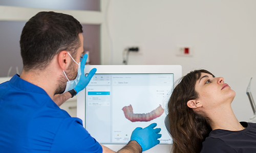Dental picture of a client showing his teeth improvement before and after transparent braces from Basma